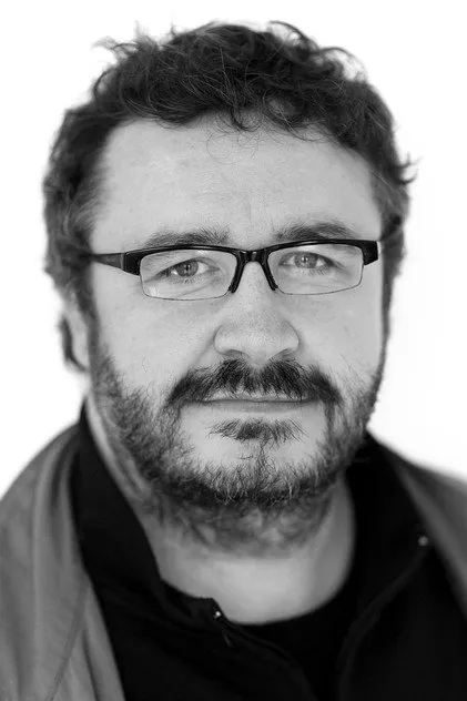 Марк Бентон